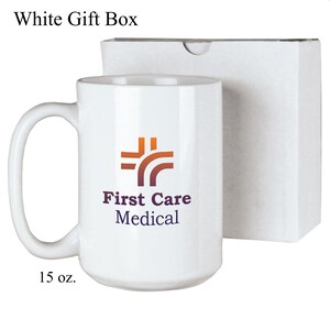 May include: White ceramic mug with a purple and orange logo that says "First Care Medical". The mug is 15 ounces and comes in a white gift box.