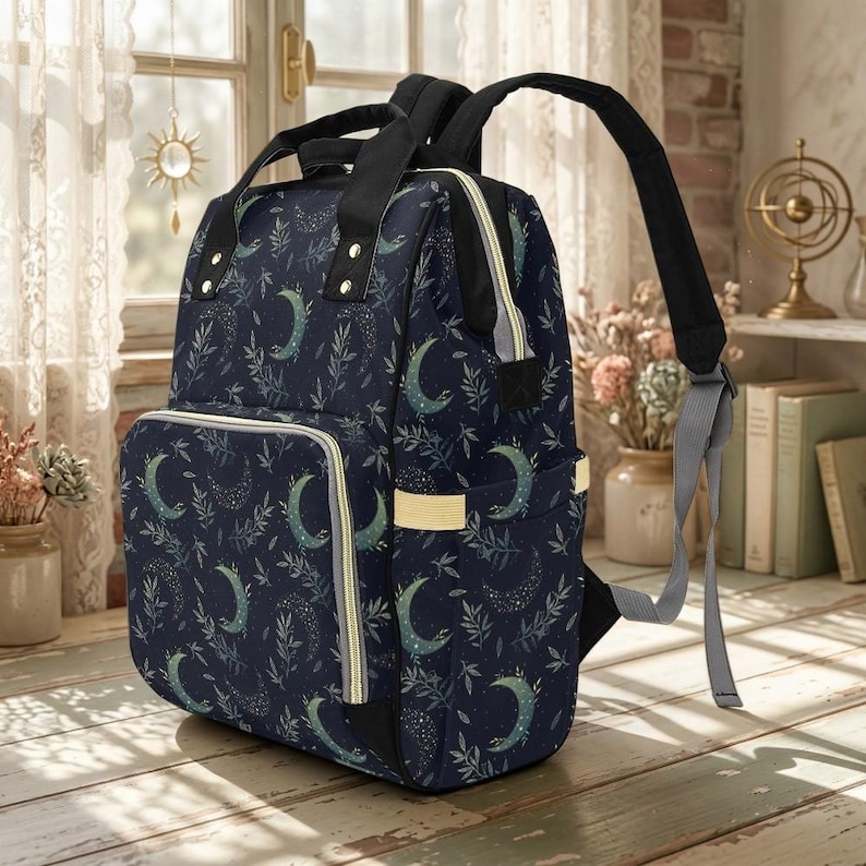 Mochila cambiador con forma de luna creciente, bolsa de viaje para bebé con diseño de luna celestial, organizador para la habitación del bebé para mamás. imagen 2