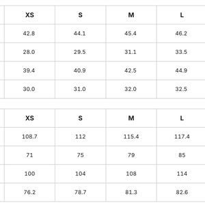 a table with various measurements and sizes for different clothing items, such as waist, hip, and insseam lengths. The table provides the corresponding sizes for each item, including 2XS, XS, S, M, L, XL, and ZL. The table is organized in a grid format, with the items listed on the left side and the corresponding measurements on the right side. The image does not contain any text that can be transcribed, and the image is described in terms of its content without providing specific details.