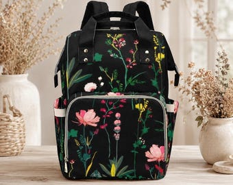 Sac à dos sac à langer floral, sacoche de voyage noire Wildflower Bloom