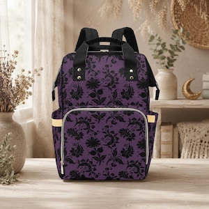 Mochila cambiador con estampado damasco morado, bolso de viaje estilo bruja gótica para mamás. imagen 2