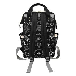 The back view of the black backpack displaying its adjustable padded shoulder straps.