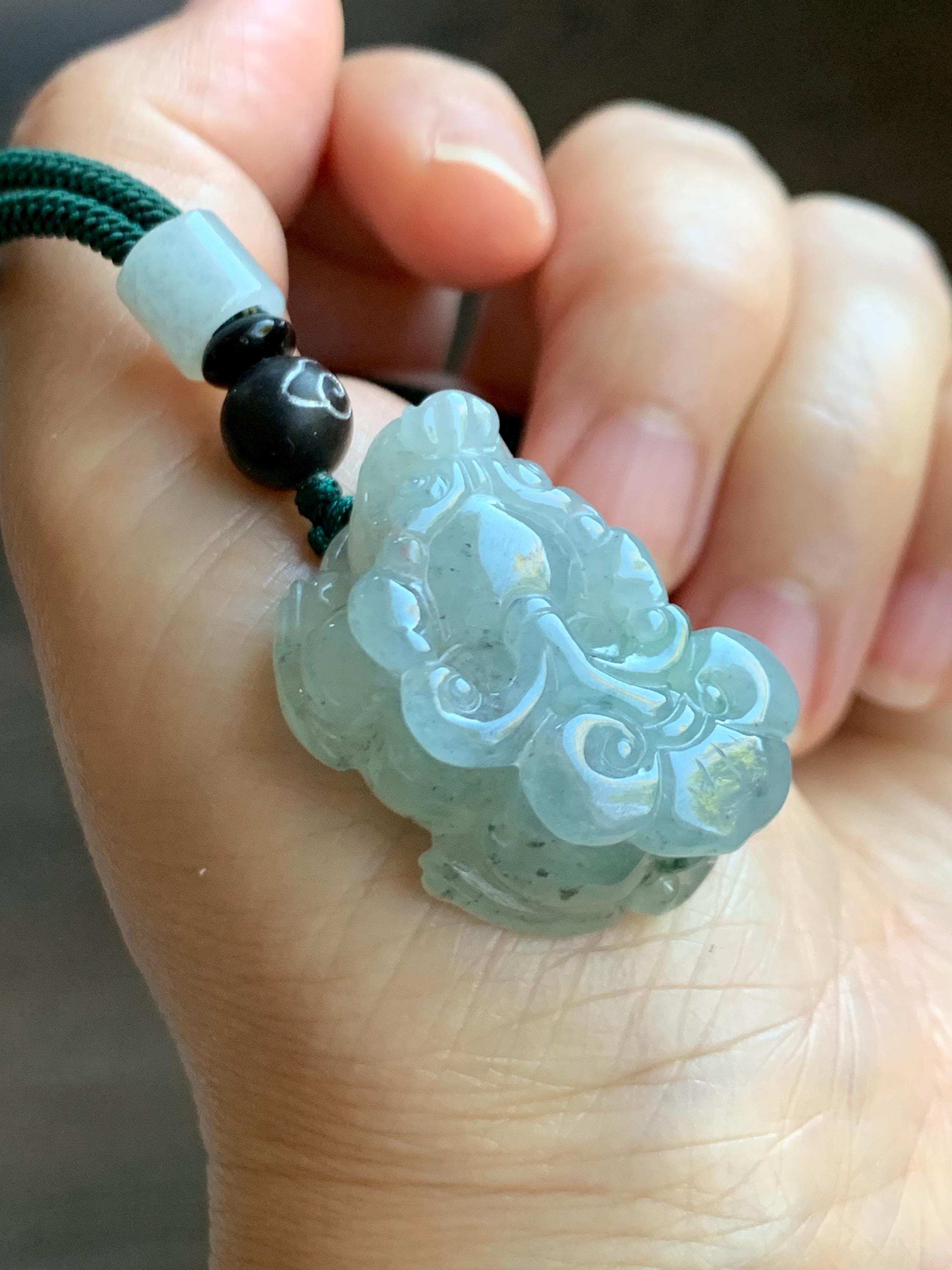 大きな天然グレード A 氷のような半透明のゼラチン状の緑色の大理石の