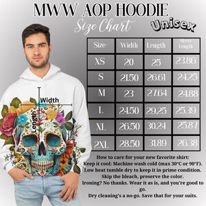 May include: White unisex hoodie with a colorful sugar skull design, surrounded by flowers. The hoodie features a size chart with measurements in inches and care instructions. The text "MWW AOP HOODIE" is at the top.