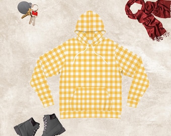 May include: A yellow and white checkered hoodie with a drawstring hood and a front pocket. A pair of gray boots, a burgundy scarf, and a set of keys are also in the image.
