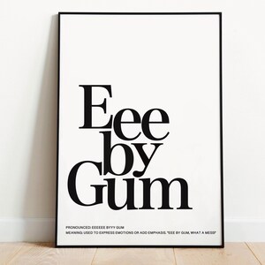 May include: Black and white typography poster with the text "Ee by Gum" and the pronunciation and meaning of the phrase.