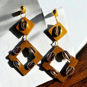 Handmade wood and cowrie  Clip On Earrings