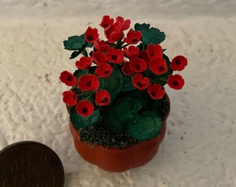 1:12 scale red geraniums in garden urn