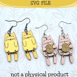 May include: A digital download of an SVG file for laser cutting a pair of cat earrings. The earrings are available in two colors: yellow and pink. The cat design features a smiling face and a yarn ball.