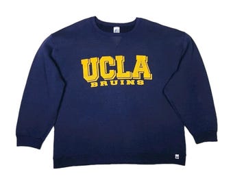 Sudadera vintage de los 90 de los UCLA Bruins, talla XL, estilo desgastado, marca Russell Athletic, NCAA, ropa deportiva universitaria retro.