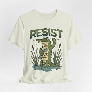 ワニに抵抗する抗議Tシャツ、国立公園を守ろう、エコ活動Tシャツ、エバーグレーズ国立公園Tシャツ、アルカトラズ阻止ユニセックスTシャツ