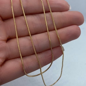 Timeless solid layered necklace in silver and gold colours