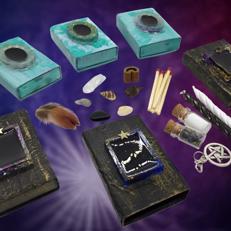 May include: An assortment of mystical items, including teal boxes with circular embellishments, small jars, candles, and a pentagram charm. Additional items include matches, feathers, and various stones and shells. The items are arranged on a gradient purple and blue background.