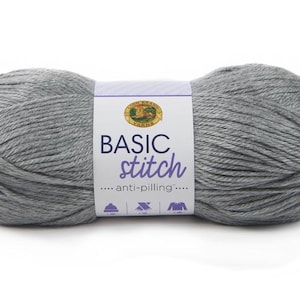 May include: A skein of gray yarn labeled "Basic Stitch - anti-pilling" by Lion Brand Yarn.