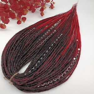 Black-Red  crochet dreads. A mix of synthetic dread textures and handmade braids. Thin black dreads with natural looking loose ends.