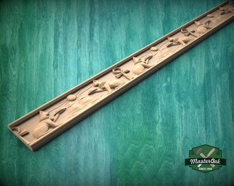 Snidad egyptisk kattlist – Dekorativ träfrislist för inredning