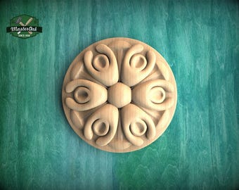 Spiral Flower Rosette – Carved Wooden Ornament with Flowing Petals Description: