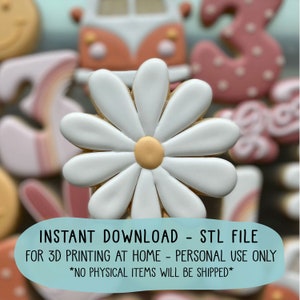 May include: A white daisy cookie with a yellow centre. The cookie is surrounded by other cookies, including a van, a rainbow, and a number 3. The text "INSTANT DOWNLOAD - STL FILE FOR 3D PRINTING AT HOME - PERSONAL USE ONLY *NO PHYSICAL ITEMS WILL BE SHIPPED*" is written on a blue background.