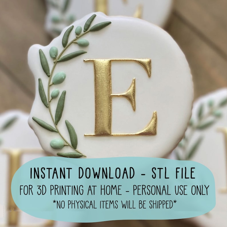 May include: A white cookie with a gold letter E and a green leafy wreath around it. The cookie is for 3D printing at home.  INSTANT DOWNLOAD - STL FILE FOR 3D PRINTING AT HOME - PERSONAL USE ONLY *NO PHYSICAL ITEMS WILL BE SHIPPED*
