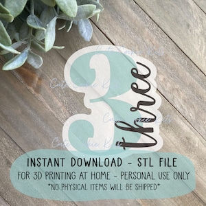 May include: A 3D printable STL file for a light blue number three with the word "three" written in black cursive script. The text "INSTANT DOWNLOAD - STL FILE FOR 3D PRINTING AT HOME - PERSONAL USE ONLY *NO PHYSICAL ITEMS WILL BE SHIPPED*" is written below the number.