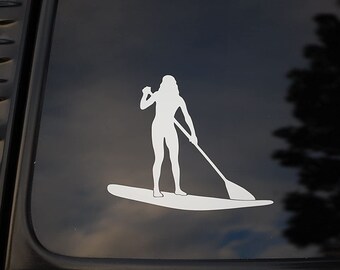 May include: White silhouette of a person stand up paddleboarding on a white paddleboard with a white paddle.