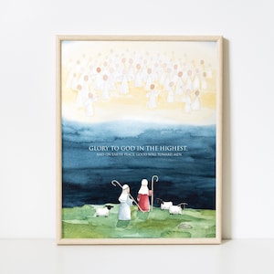 May include: Watercolor print in a light wooden frame. The artwork depicts a celestial scene with angels above, a dark blue sky, and shepherds with sheep below. The text "GLORY TO GOD IN THE HIGHEST. AND ON EARTH PEACE GOOD WILL TOWARD MEN" is included.