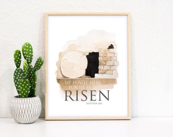 May include: A watercolor painting of a stone tomb with a large stone rolled away. The text "He is not here for He is risen" is written below the tomb, with the scripture reference "Matthew 28:6" underneath.