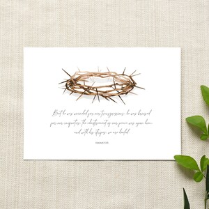 May include: A watercolor illustration of a crown of thorns with a quote from Isaiah 53:5: "But he was wounded for our transgressions, he was bruised for our iniquities: the chastisement of our peace was upon him; and with his stripes we are healed."