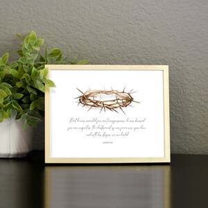 May include: A printable art print with a watercolor illustration of a crown of thorns. The print features a quote from Isaiah 53:5: "But he was wounded for our transgressions, he was bruised for our iniquities: the chastisement of our peace was upon him; and with his stripes we are healed."
