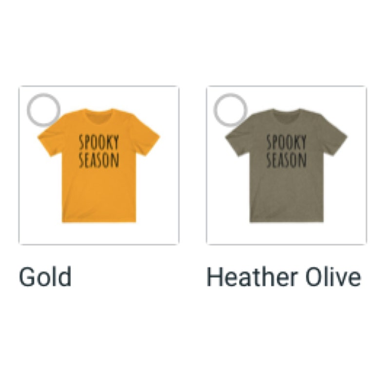 May include: Two t-shirts with the text "Spooky Season" printed on them. The shirt on the left is gold and the shirt on the right is heather olive.