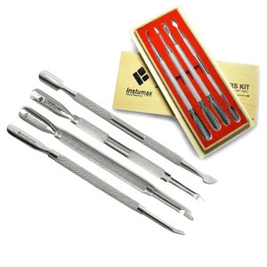 May include: Set of four silver nail art tools with a textured grip. The tools are in a wooden box with a red felt lining and the Instumax logo. The tools are labelled "Instumax" on the handles.