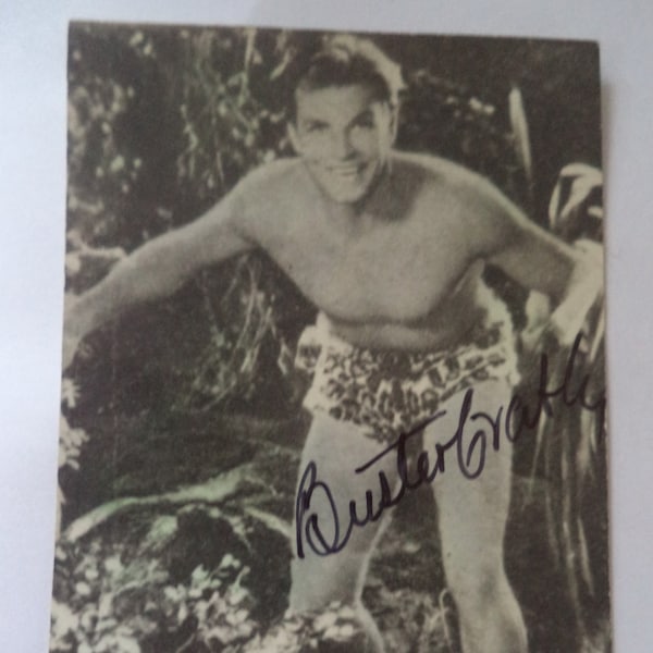 BUSTER CRABBE (1908 – 1983) Autograph, hand signed on small vintage photo: played Tarzan, Flash Gordon and Buck Rogers