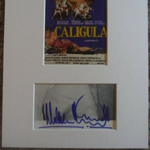 MALCOLM McDOWELL Autograph Mounted Display, hand signed on magazine cutting, was in the 1979 film &quot;Caligula&quot;