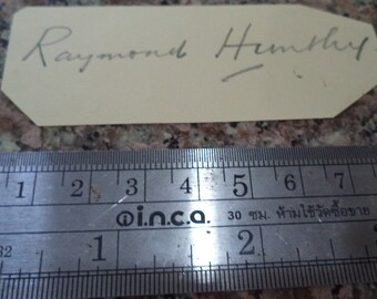 RAYMOND HUNTLEY (1904 – 1990) Autograph, hand signed cut page