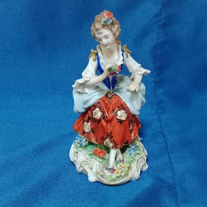 SITZENDORF porcelain figurine of a young lady with flower