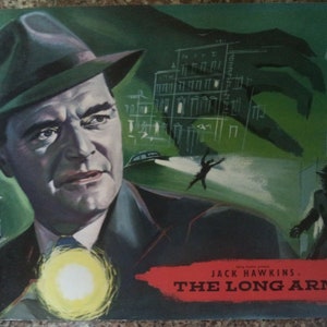 May include: A vintage movie poster featuring Jack Hawkins in the film "The Long Arm". The poster is green and features a man in a fedora and a large hand reaching down from the sky.