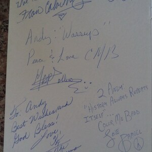 May include: A white card with handwritten messages and signatures. The text includes "To: Andy", "Wassup", "Peace & Love", "Best Wishes", "God Bless", "Love", "History Always Repeats Itself", "Color Me Badd", and "Love".