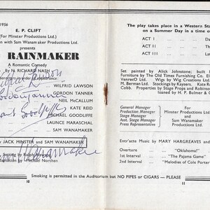 May include: A black and white playbill for a production of "The Rainmaker" by N. Richard Nash. The playbill lists the cast and crew, including the director Jack Minster and the producer Sam Wanamaker. The playbill also includes information about the setting, costumes, and music.