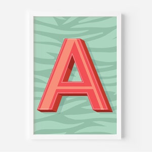 May include: A framed print displaying a large, three-dimensional letter "A" in coral and red hues. The letter is set against a light teal background with a wavy pattern. The print is enclosed within a white frame.