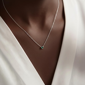 Family birthstone necklace with multiple gemstones, meaningful personalized gift.