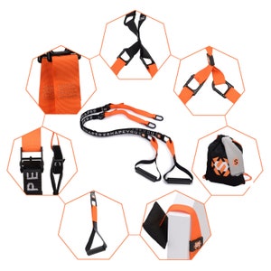 Pu&ograve; includere: Cinghie di allenamento in sospensione arancioni e nere con fibbie e maniglie regolabili. Le cinghie sono etichettate "SHAPED 2 SHAPE YOU". Il set include una borsa a cordoncino nera con un logo bianco.