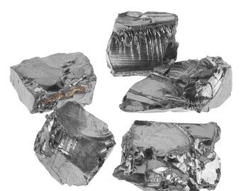 May include: Five pieces of raw, metallic, gray, irregularly shaped, shiny, and reflective,  elemental tellurium.