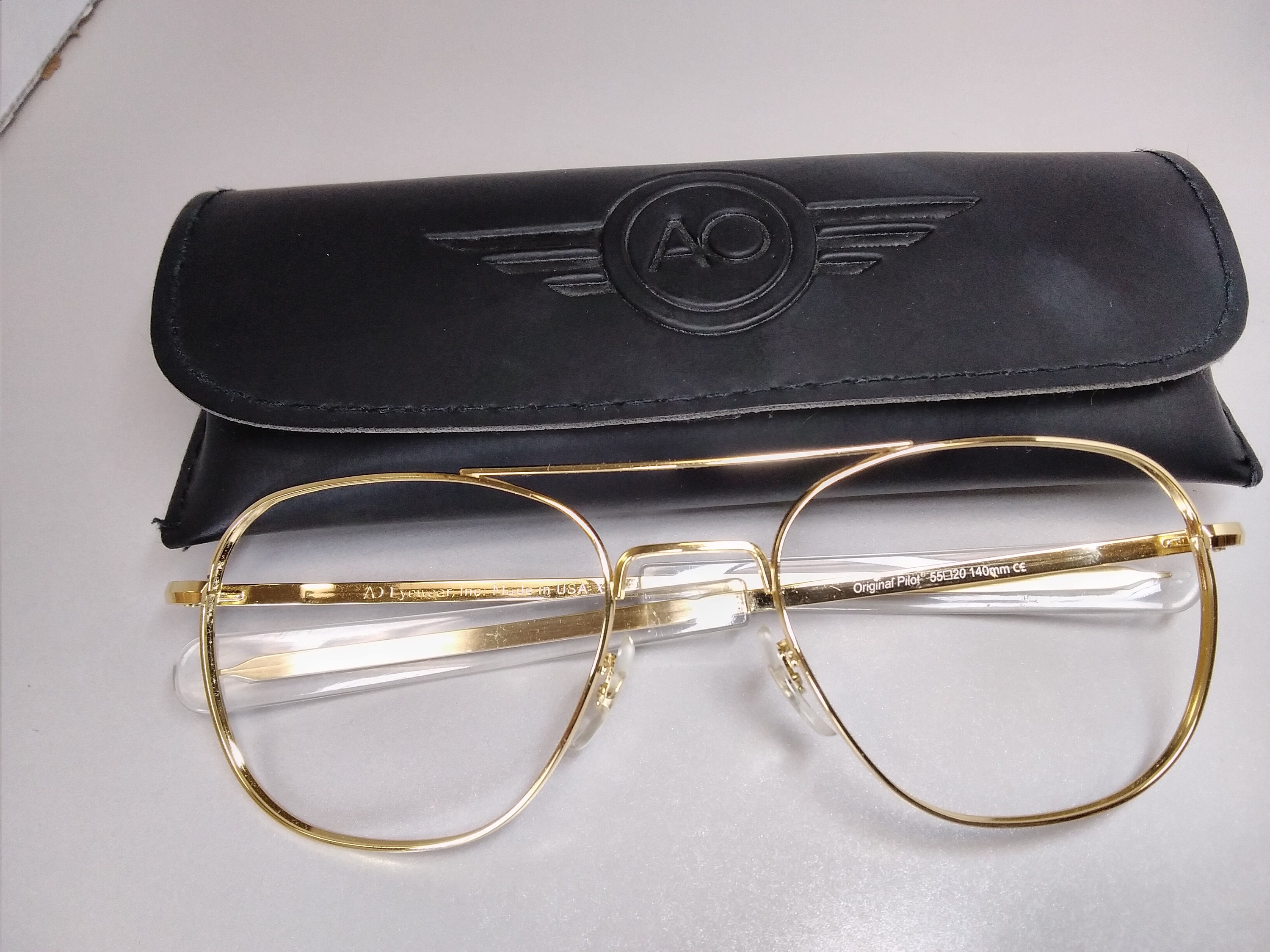 Optical: Pilot Eyeglasses, metal & calfskin — Fashion