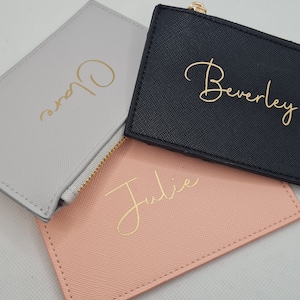 Personalised card hold with zip coin section