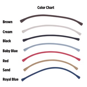 May include: Colour chart showing different colours of elastic cord. The colours are brown, cream, black, baby blue, red, sand, and royal blue.