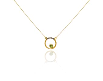 Oval Peridot and Diamond Pendant: 14k Yellow Gold Chain