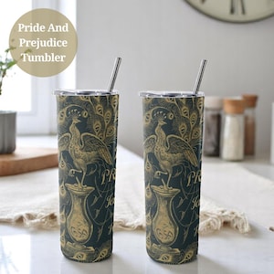 May include: Two stainless steel tumblers with a black and gold design featuring a peacock and the text "Pride and Prejudice".
