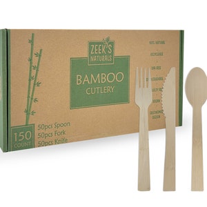 May include: A cardboard box of bamboo cutlery with the text "ZEEK'S NATURALS BAMBOO CUTLERY". The box contains 150 pieces: 50 spoons, 50 forks, and 50 knives. The cutlery is made of light brown bamboo and is displayed next to the box.