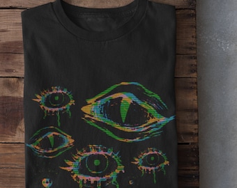 May include: Black t-shirt featuring a graphic print of several colourful eyes. The eyes are stylised and have a glitch effect.