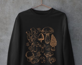 May include: Black sweatshirt with a gold outline of various mushrooms printed on the front.